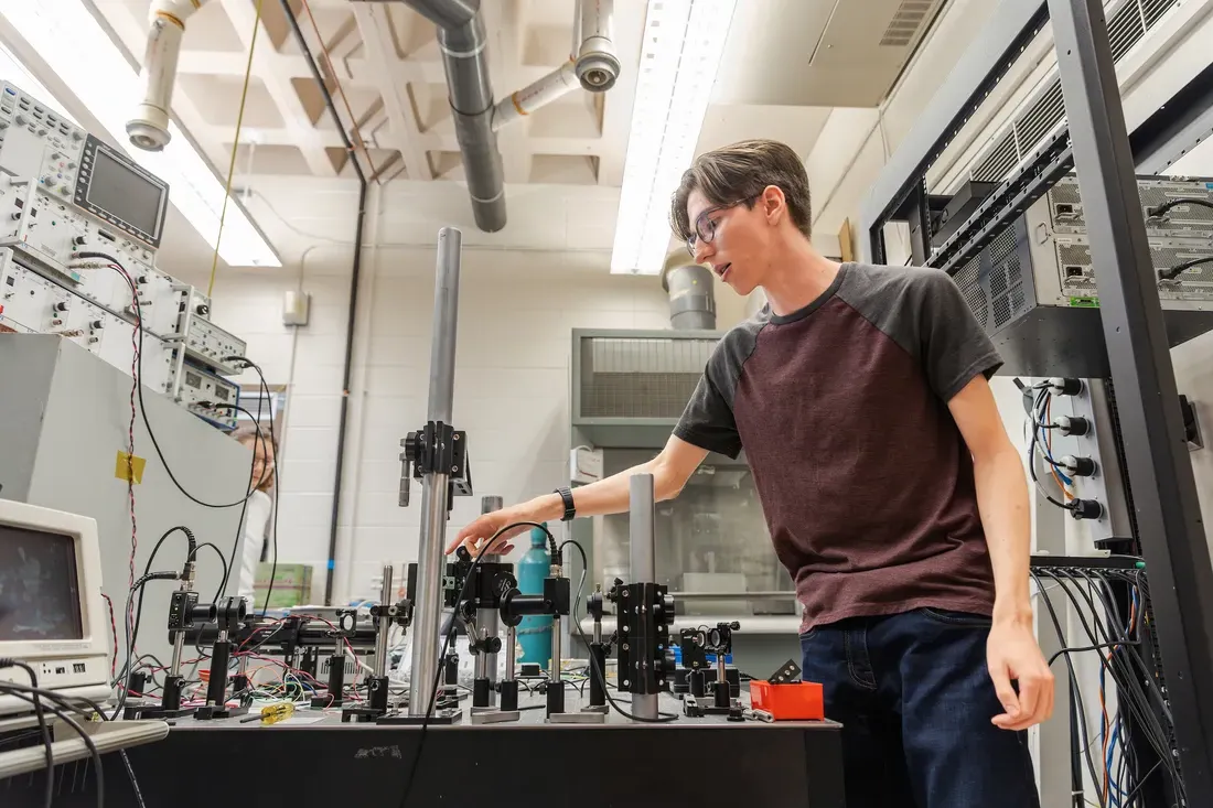 A student working in the gravitational waves research lab.